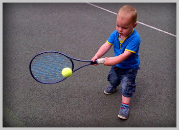Traditional Sports - Owen playing Tennis